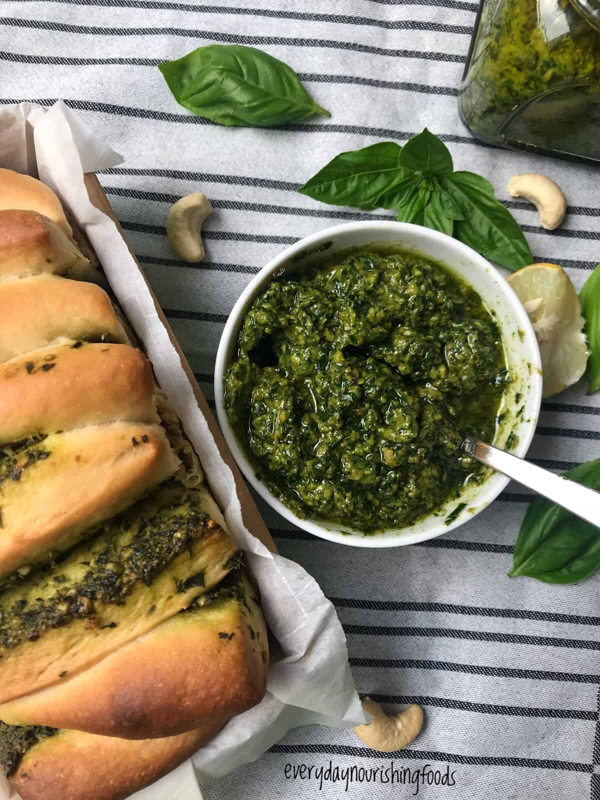 almond pesto in a bowl along with bread