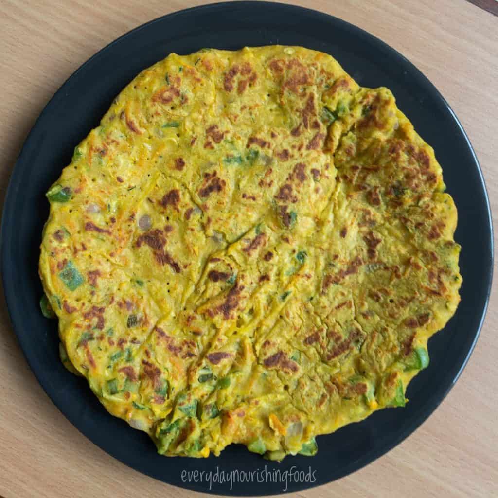 savory chickpea flour pancakes on a plate