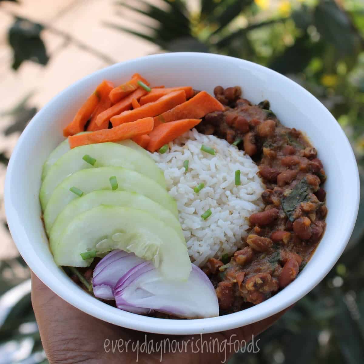 black eyed peas curry along with rice in a bowl.