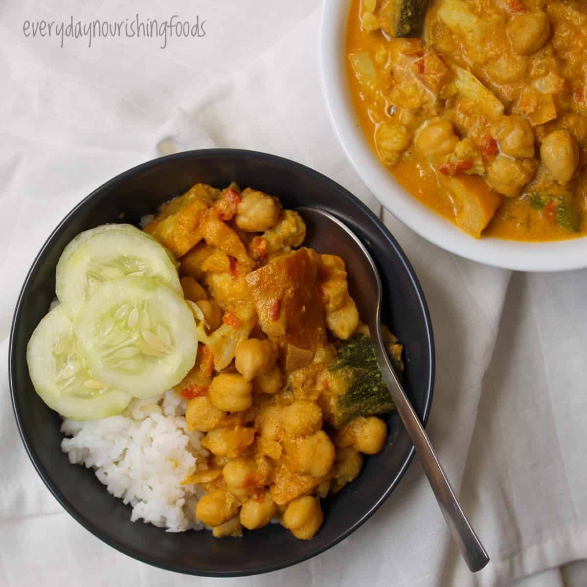 instant pot vegetable curry in a bowl along with rice