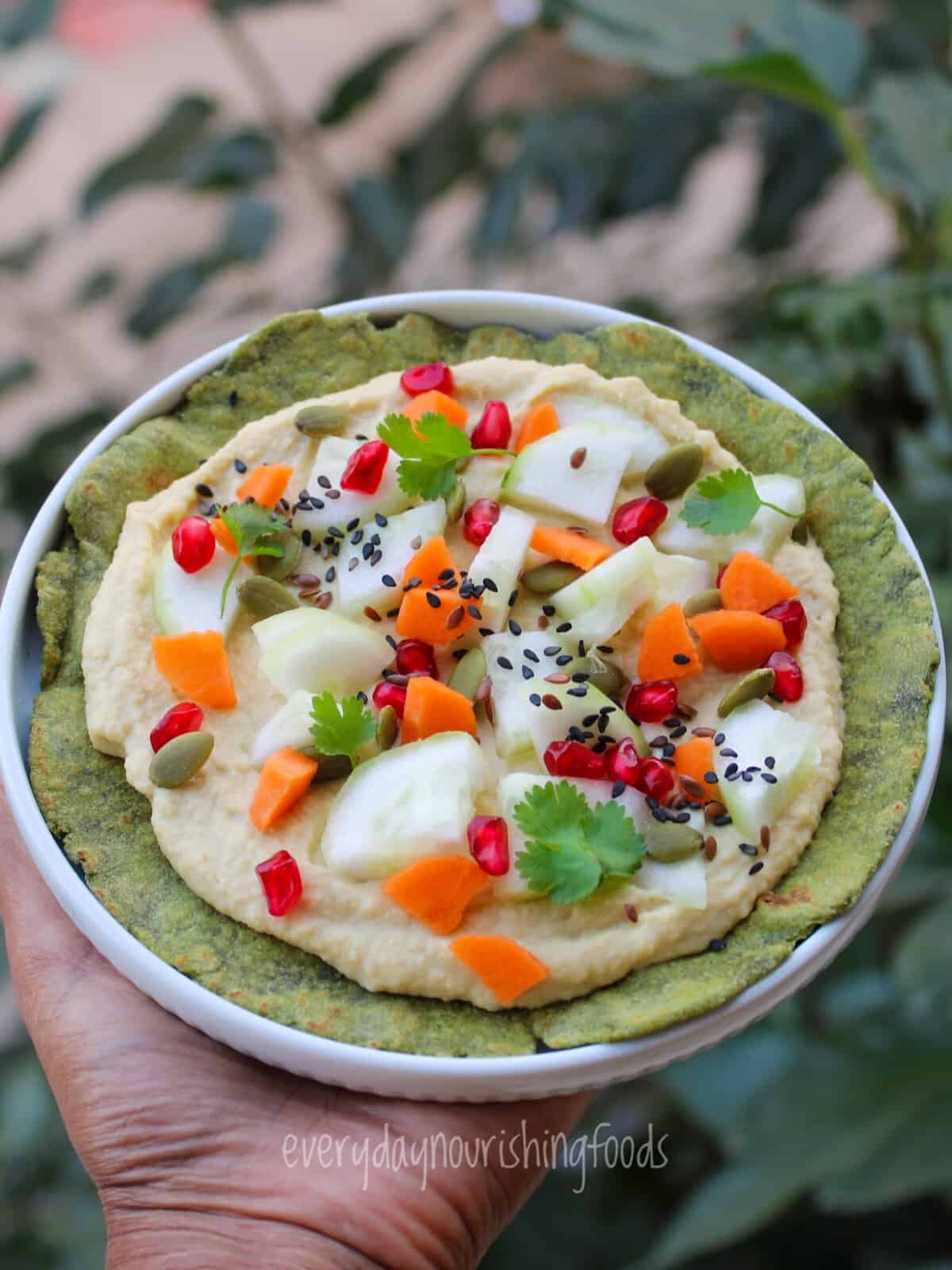 spinach tortilla with hummus and veggies