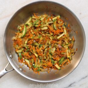 sauteed zucchini and carrots in a skillet