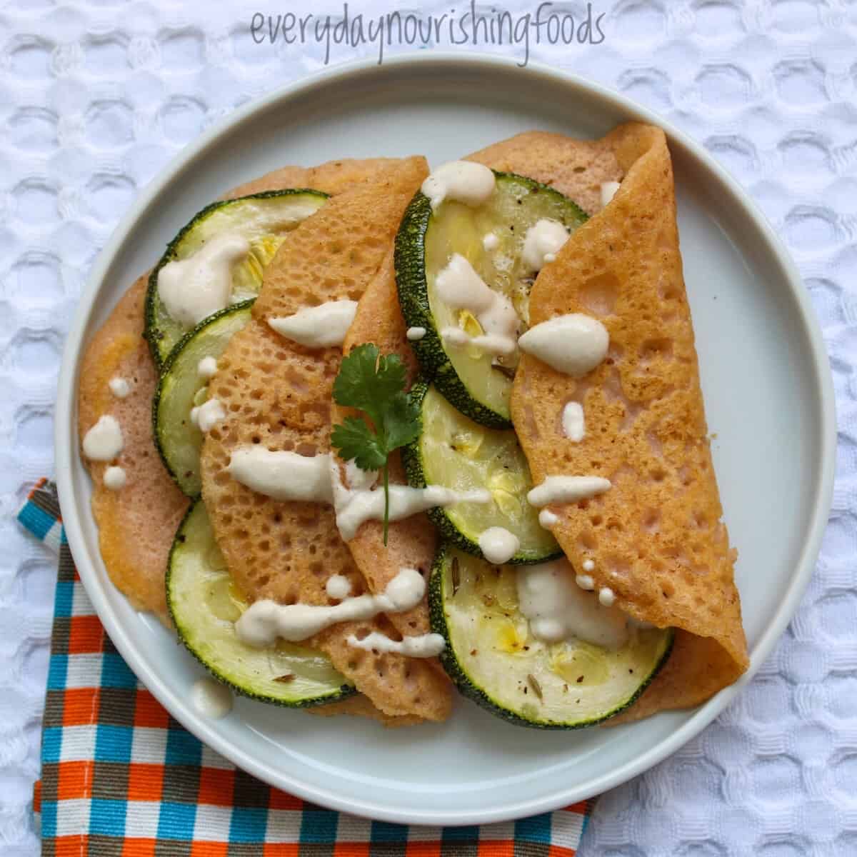 lentil tortillas with zucchini filling in a plate