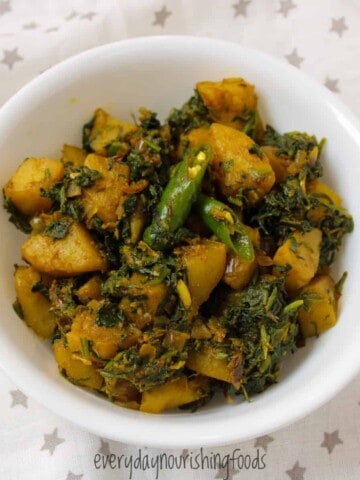 spinach potato curry in a bowl