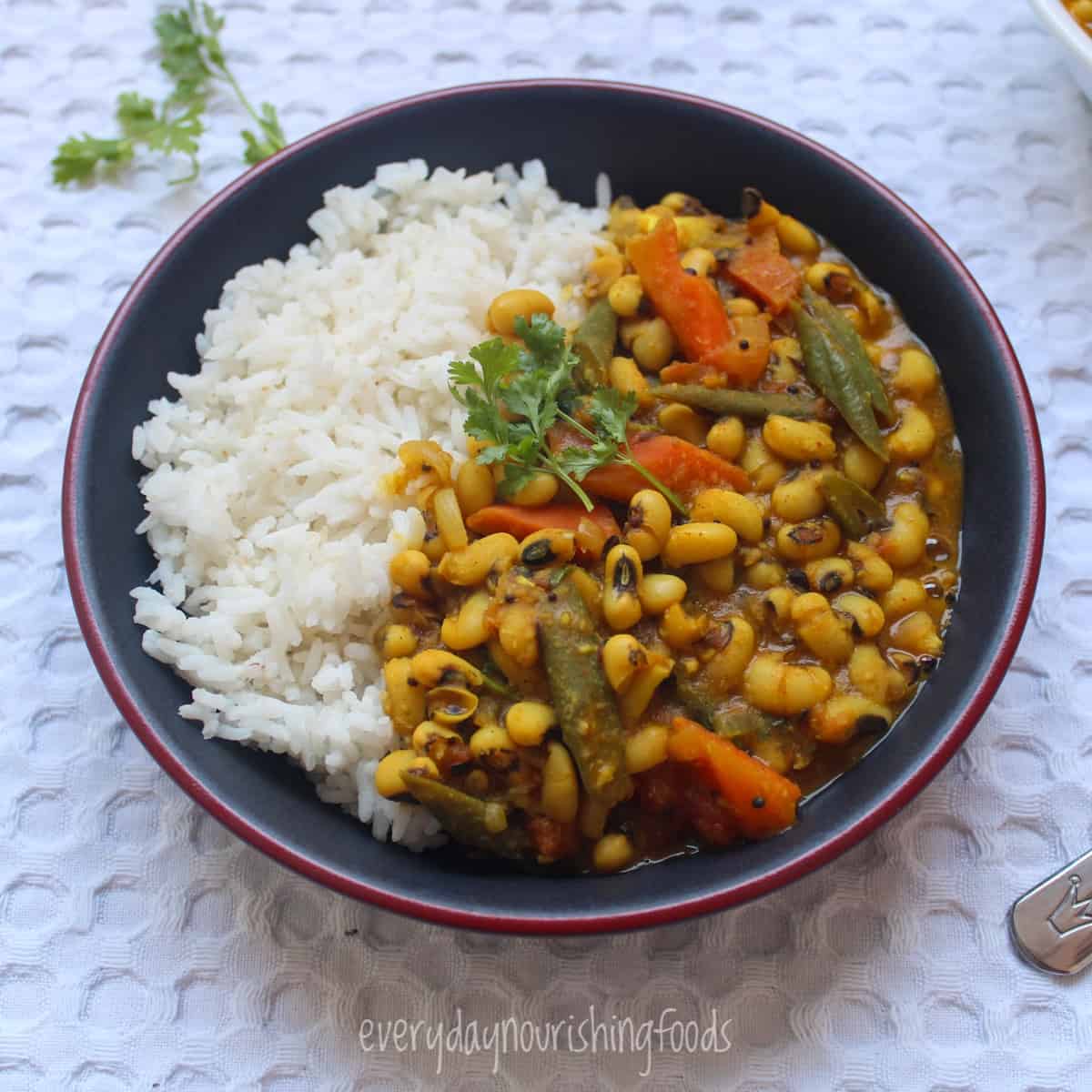 black eyed peas curry with rice in a bowl