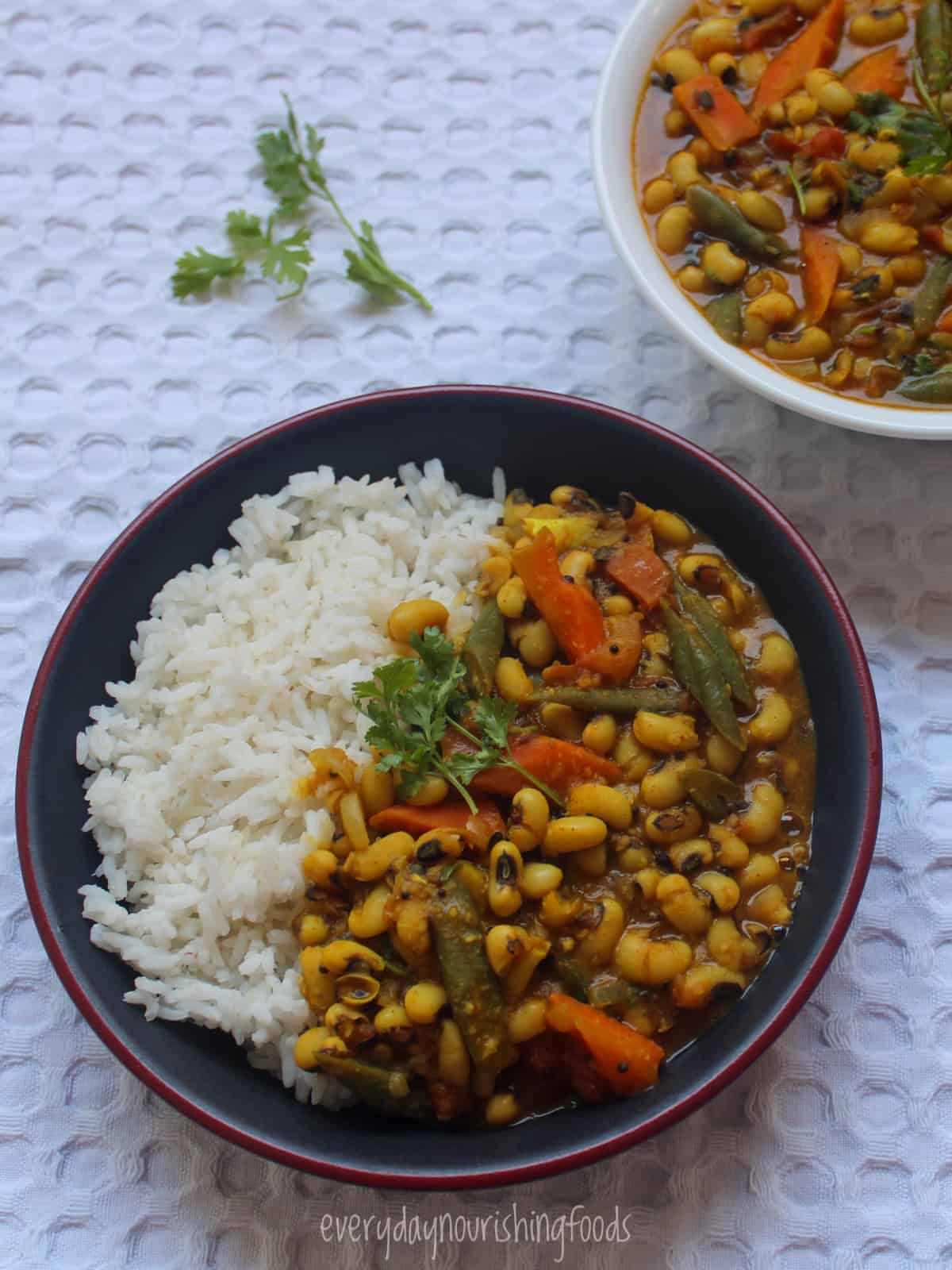 black eyed peas curry with rice in a bowl