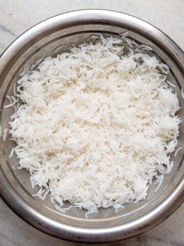 A bowl of fluffy, perfectly cooked boiled basmati rice.