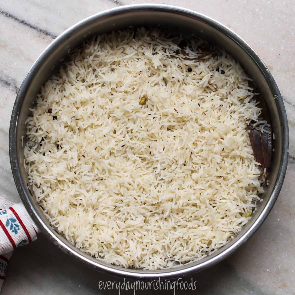 Fluffy basmati rice cooked on the stovetop with whole Indian spices.