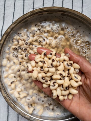 Close-up view of soaked black-eyed peas showing texture.