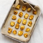 Fully roasted paneer cubes with golden edges.