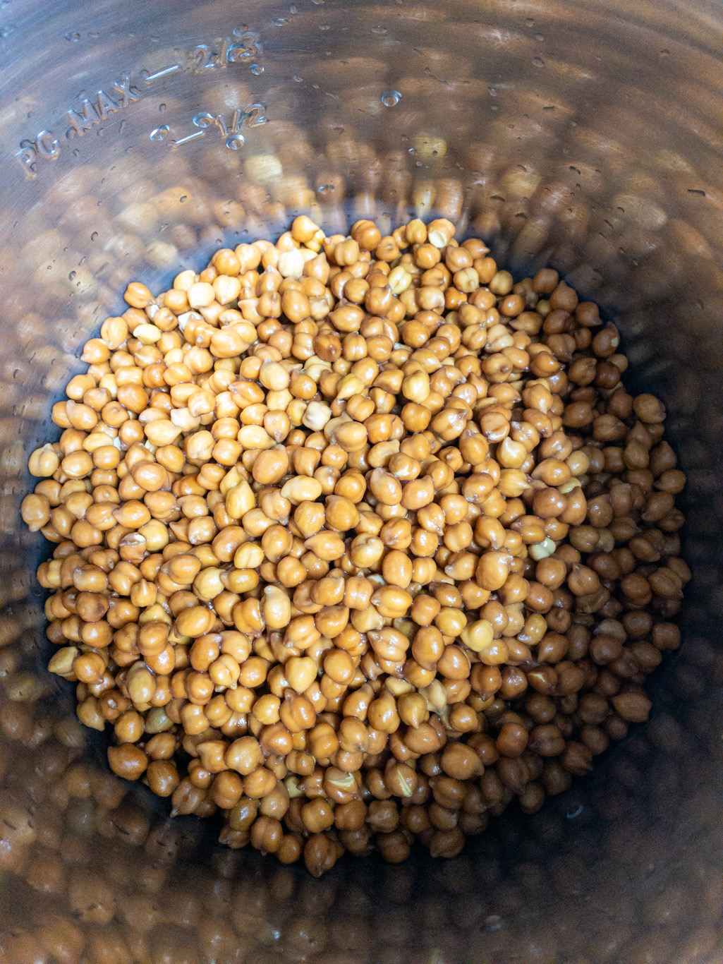 Soaked brown chickpeas drained and added to the Instant Pot insert.